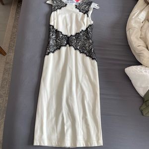 Midi dress (Bebe) with lace details. Perfect condition.